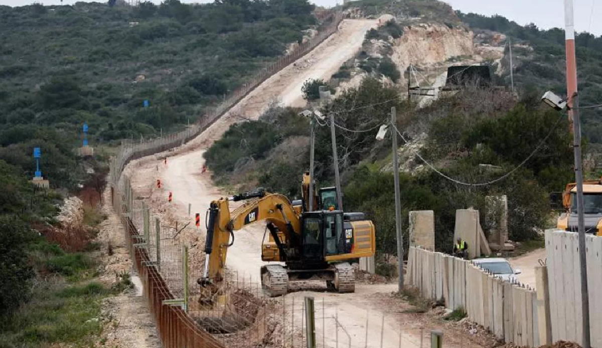Israel erects concrete barrier in disputed area